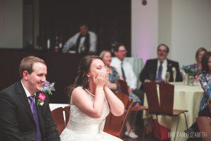 bride and groom laughing the ware center wedding reception