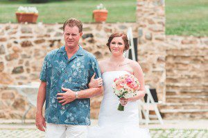 bride walking down aisle first look at groom lauxmont farms