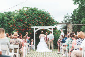 outdoor summer wedding ceremony lauxmont farms cobblestone courtyard