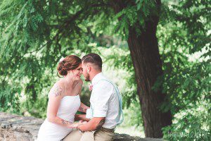 bride and groom sitting on stone bridge wrightsville pa wedding
