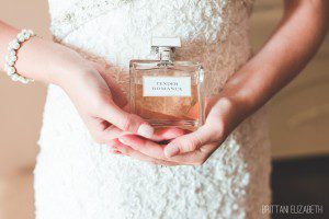 bride holding perfume wedding day scent ralph lauren tender romance