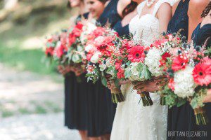 navy blue and pink bridesmaid dresses floral bouquets