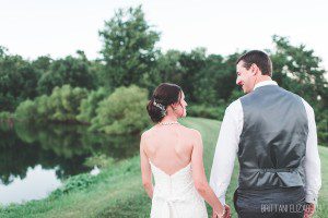 holding hands by water lodges at gettysburg wedding