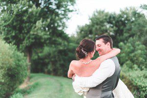 groom holding bride in arms gettysburg wedding