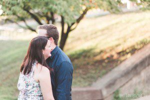 engaged couple laughing in love valley forge train station
