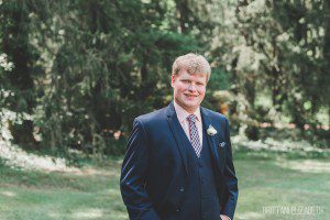 groom in navy blue suit mount gretna inn wedding