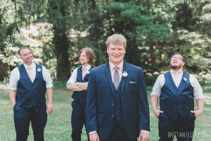 navy blue and blush wedding groom and groomsmen