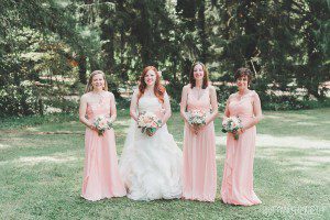 bridesmaids and bride light pink dresses