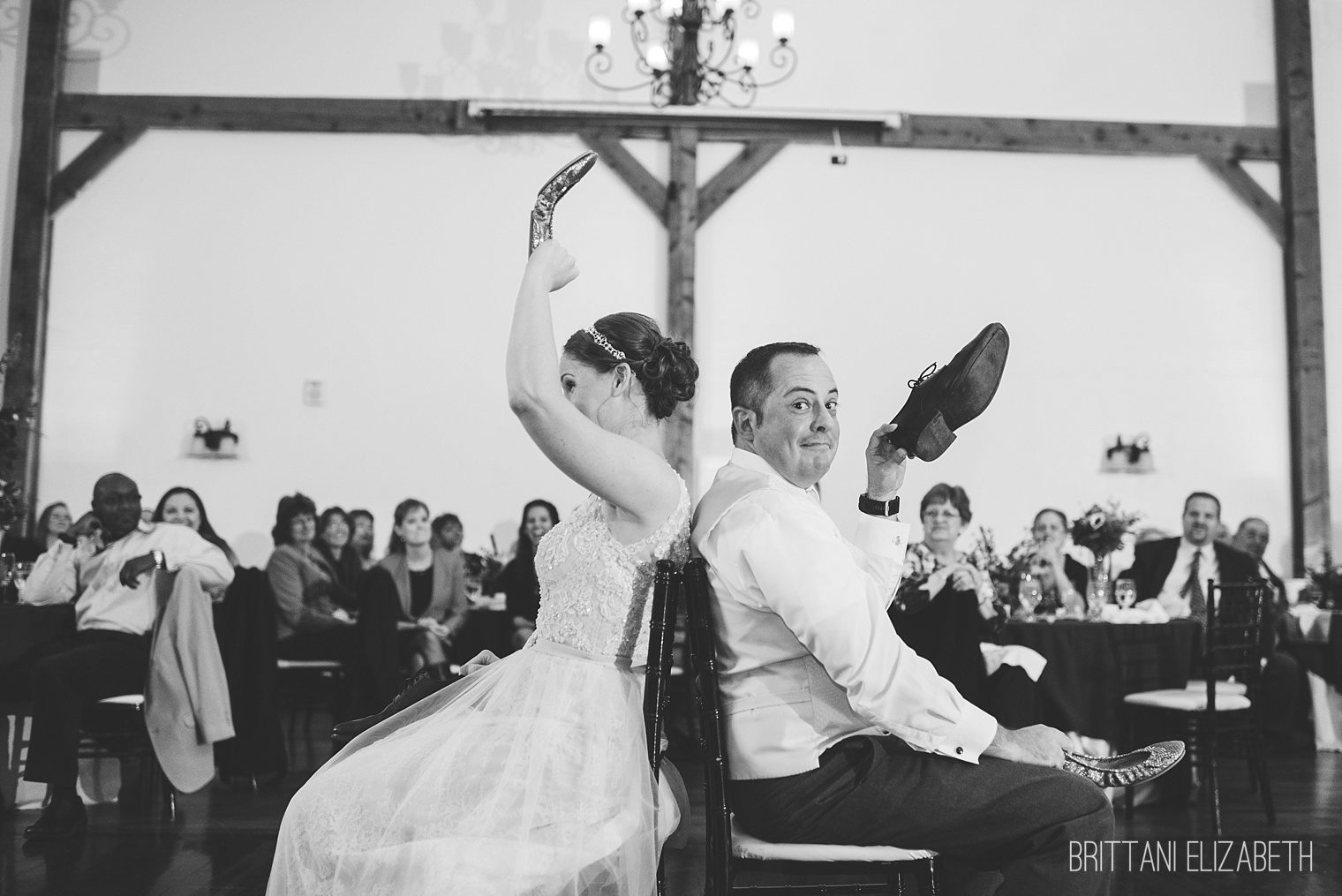 bride and groom shoe game wedding reception