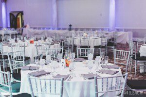 round wedding reception table purple setting