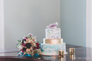 purple teal gold wedding cake