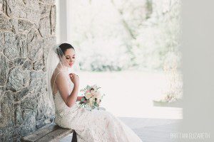 white lace bridal gown natural pink wedding bride holding bouquet