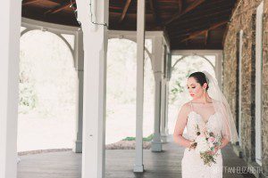 bride holding bouquet awbury arboretum natural pink wedding