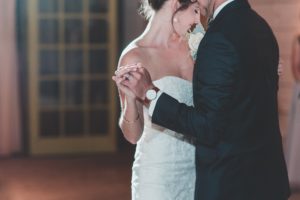 bride and groom dancing