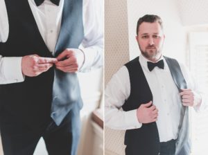 groom getting ready buttoning suit vest