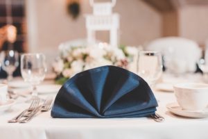 blue napkin wedding reception table setting
