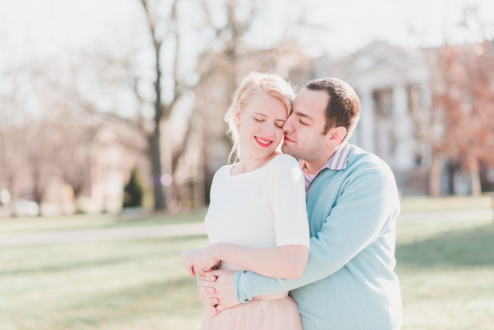 engaged couple embracing winter gettysburg college engagement