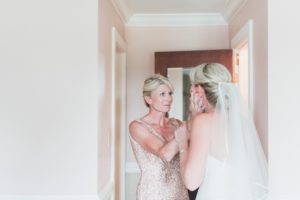 mother of the bride first look at bride