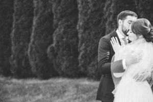 bride and groom black and white outside