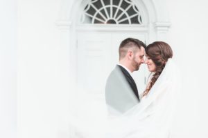 bride and groom nuzzling in love wedding in emmaus