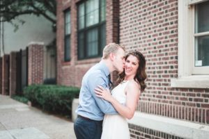 stealing kisses engaged couple in old city philadelphia