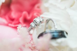 wedding rings in bouquet flowers