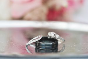 three stone halo engagement ring wedding rings close up