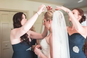 putting veil on bride colonial pines wedding