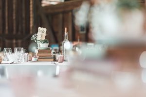 reception table antique books succulent centerpiece