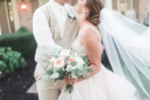bride with groom and bouquet weddings near harrisburg pa