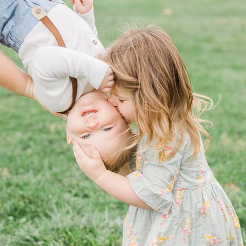 Sister Kissing Brother